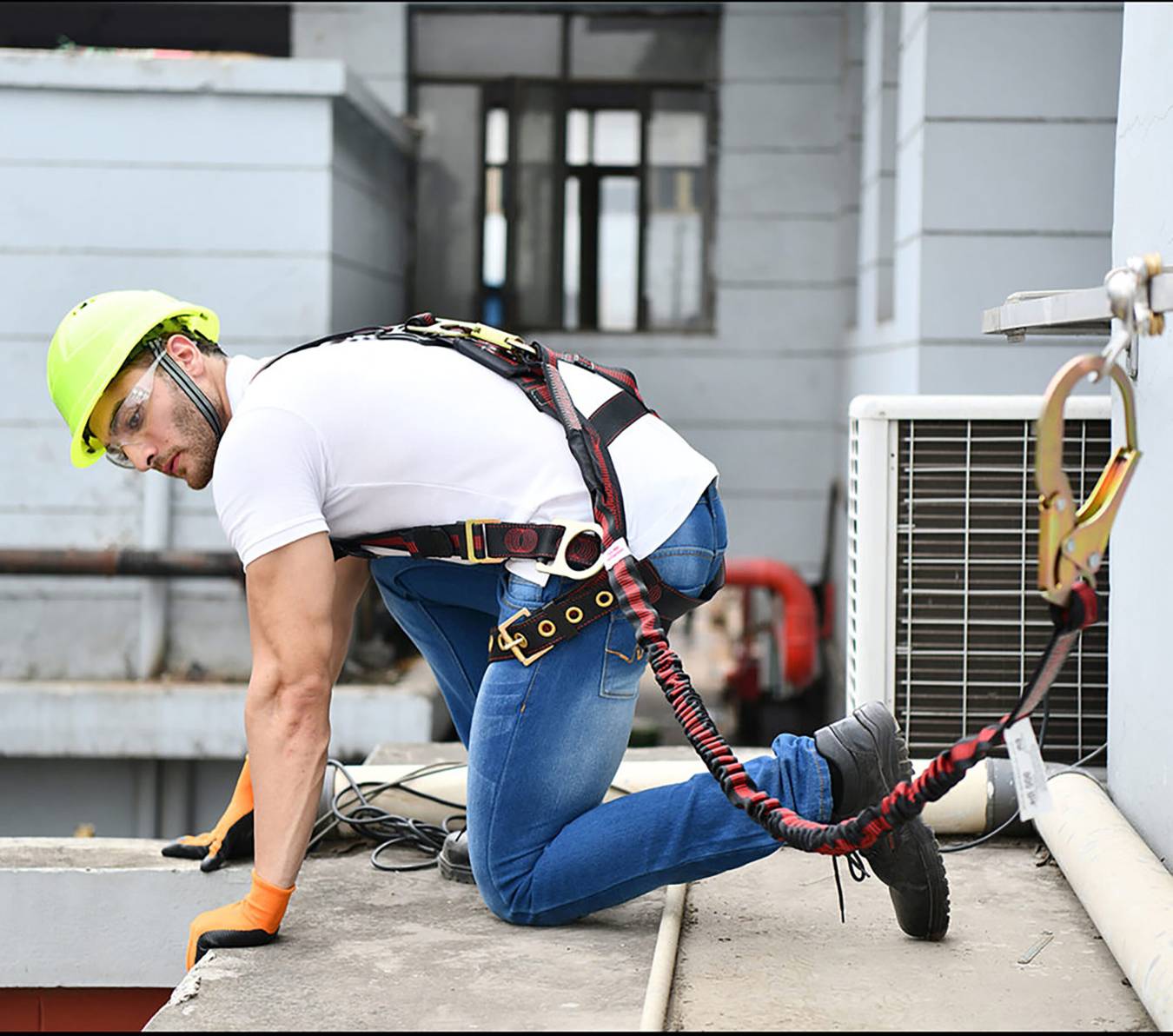 Tiresocks - two heavy-duty blue and black construction chest harnesses for fall protection