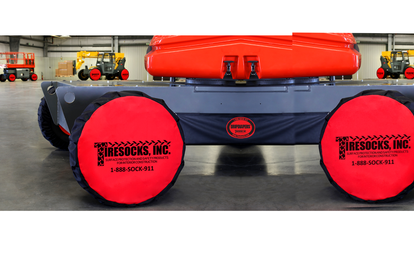 Tiresocks - Closeup of a TireSocks non-marking black and red tire cover on a construction vehicle